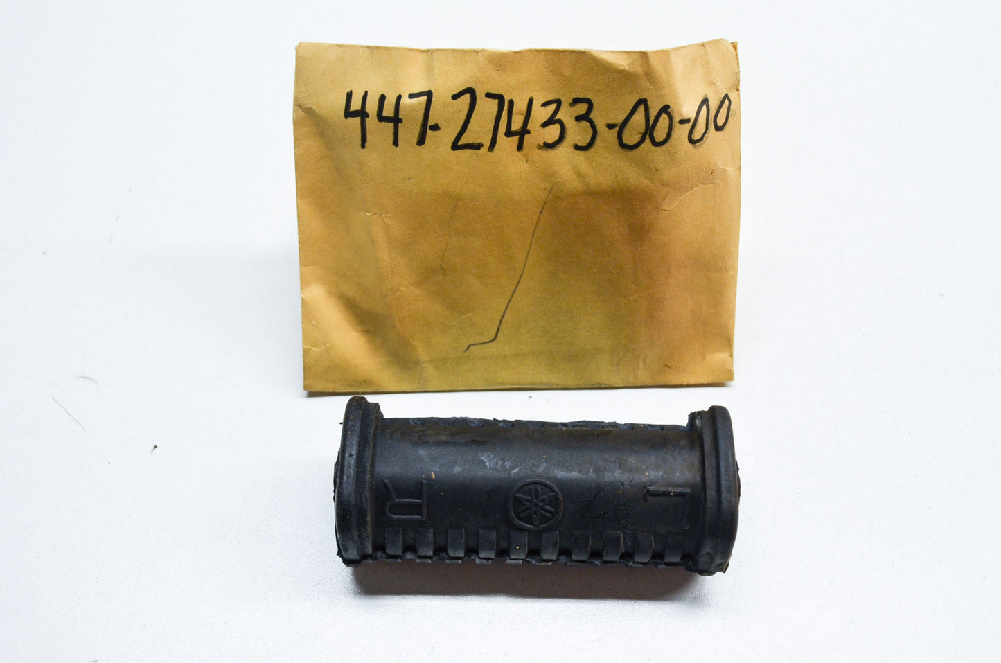 OEM Yamaha 447-27433-00-00 Rear Footrest Cover NOS