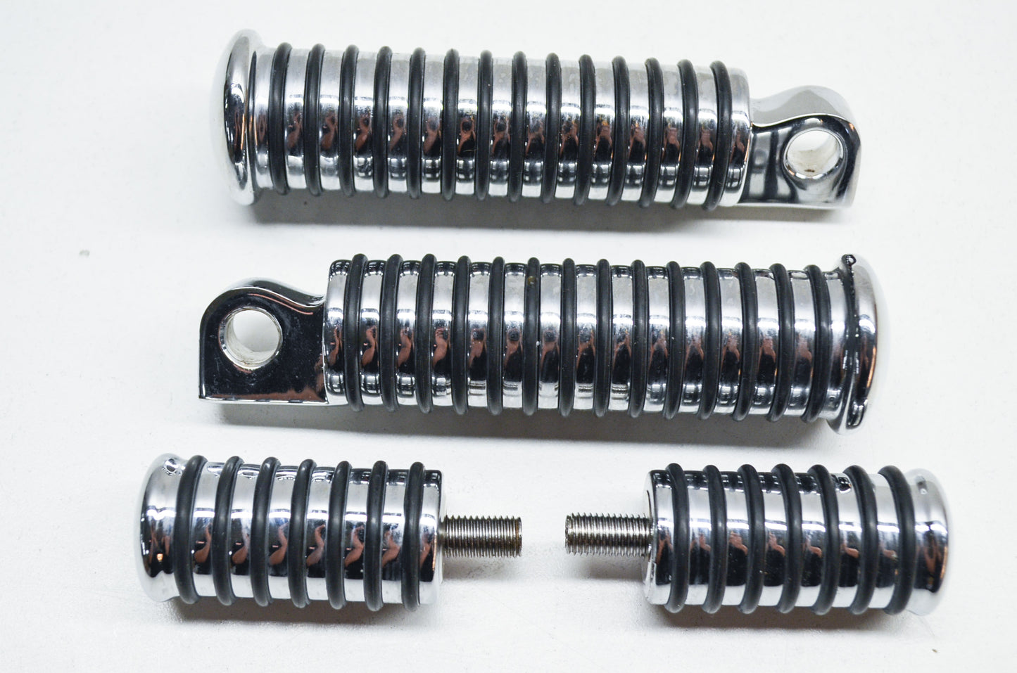 Male Foot peg Two Large Two Small NOS