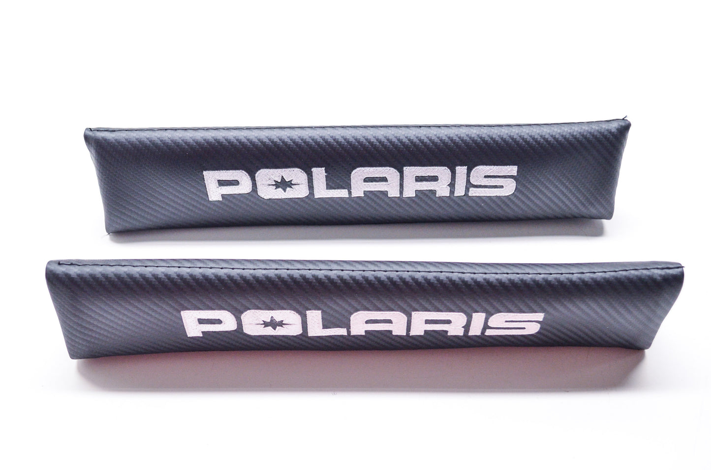 New OEM Polaris Carbon Seat Belt Pad Qty 2 NOS