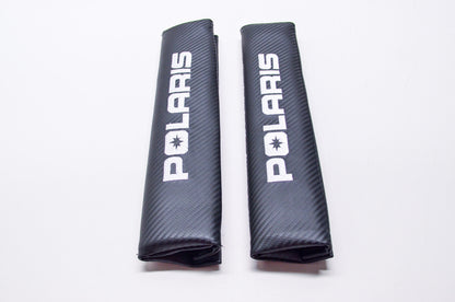 New OEM Polaris Carbon Seat Belt Pad Qty 2 NOS