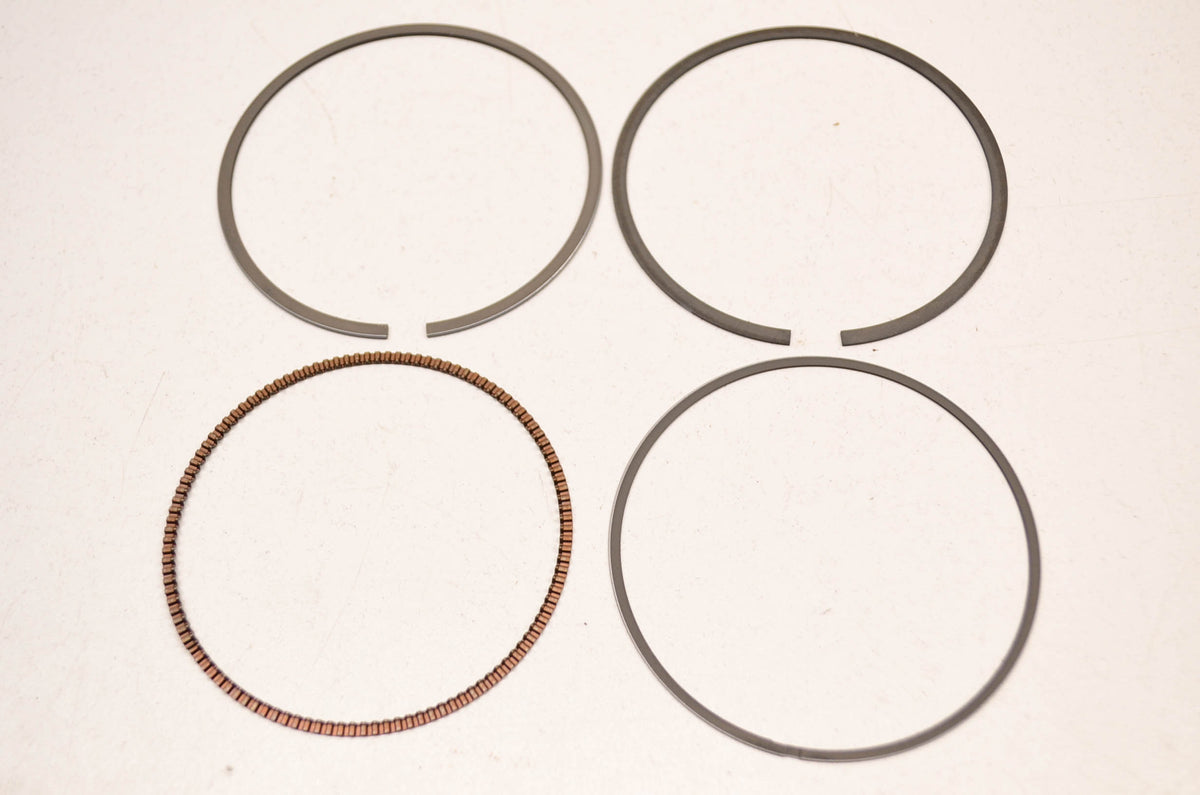 OEM Suzuki 12140-33E20 Piston Ring Set NOS