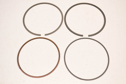 OEM Suzuki 12140-33E20 Piston Ring Set NOS