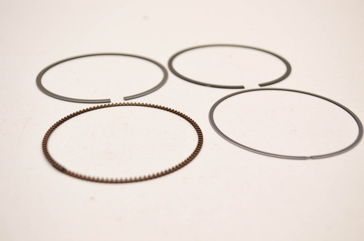 OEM Suzuki 12140-33E20 Piston Ring Set NOS