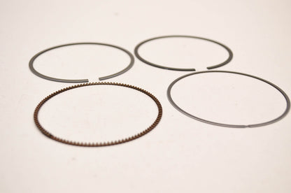OEM Suzuki 12140-33E20 Piston Ring Set NOS