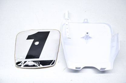 United Motors SY1P08WH, 53112-K1250WH Front Number Plate White NOS
