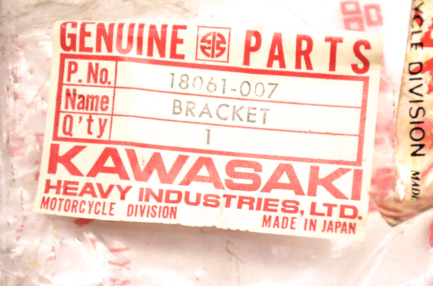 OEM Kawasaki 18061-007 Upper Muffler Bracket NOS