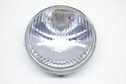 OEM Kawasaki 23007-011 Headlight Lens NOS