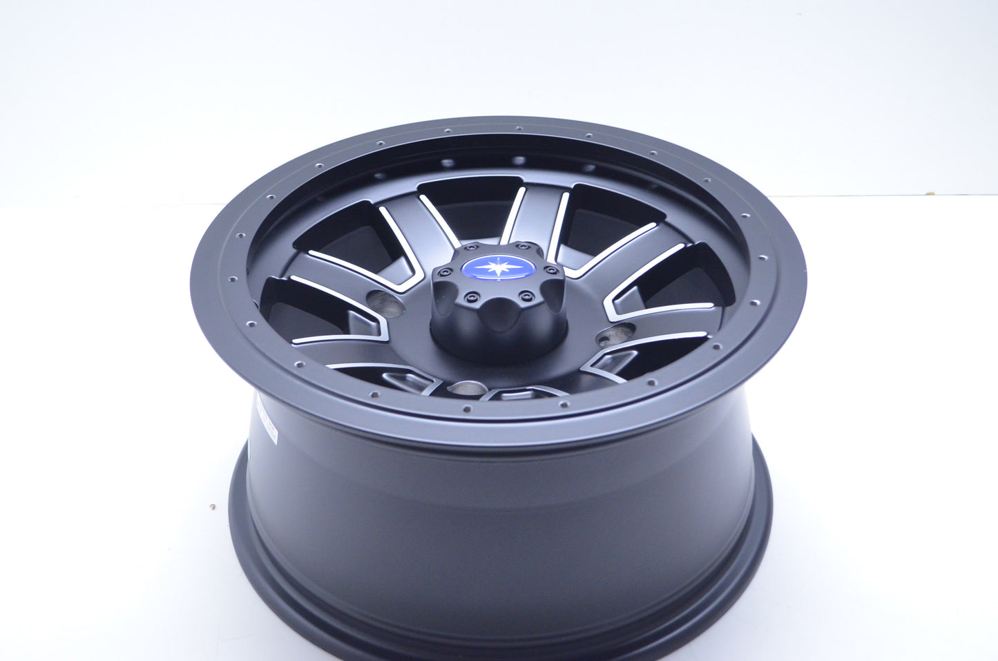 New OEM Polaris Matte Black Front Rim NOS