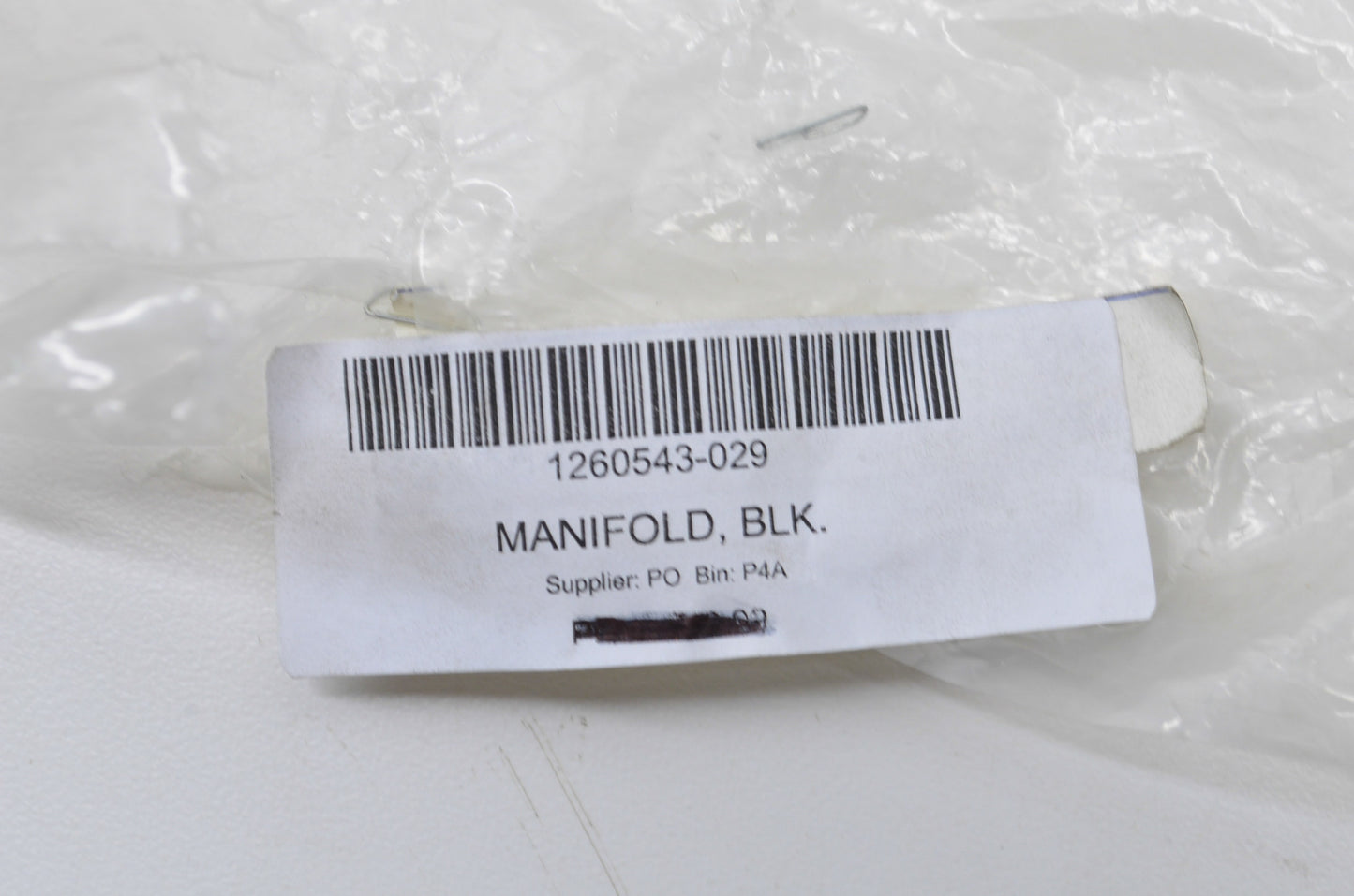 OEM Polaris 1260543-029 Black Manifold NOS