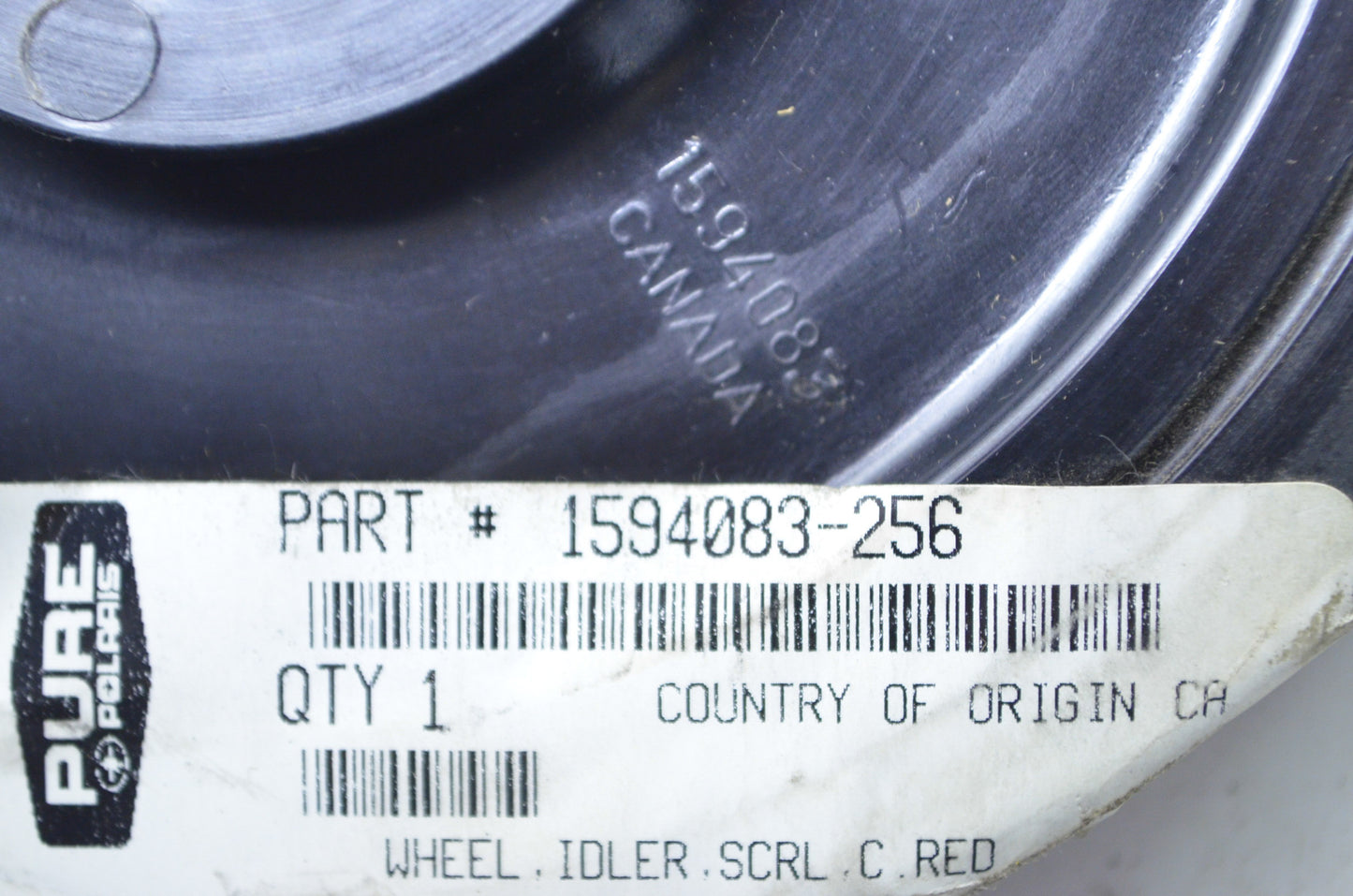 New OEM Polaris Red Idler Wheel NOS