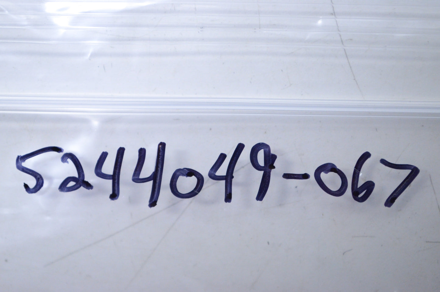 OEM Polaris 5244049-067 Black Radius Rod Support Bracket NOS