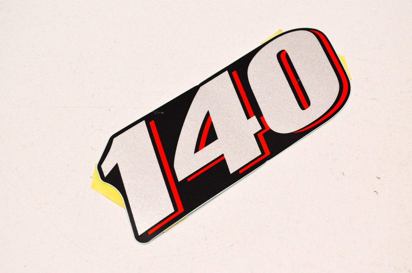 140 Emblem NOS