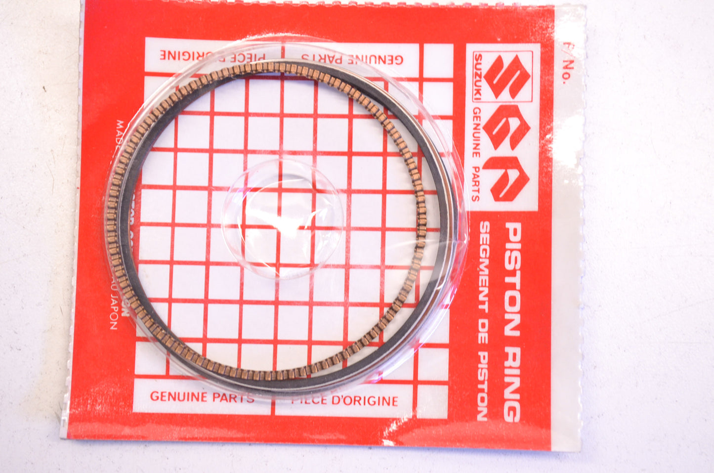 OEM Suzuki 12140-87J01 Piston Ring Kit NOS