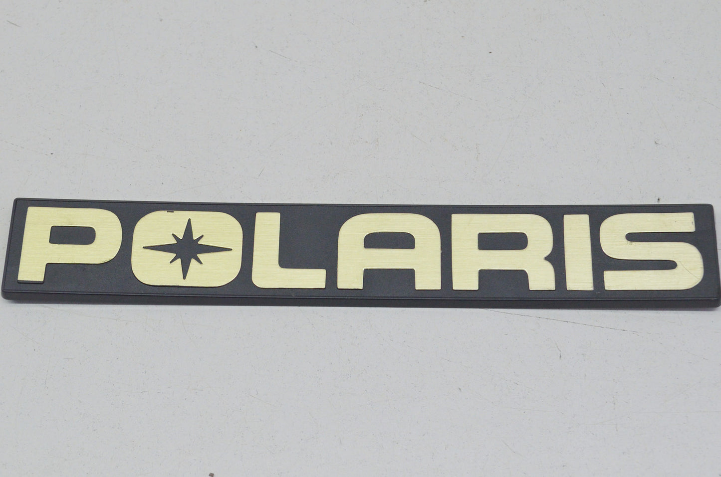 New OEM Polaris Gold Logo Plate NOS