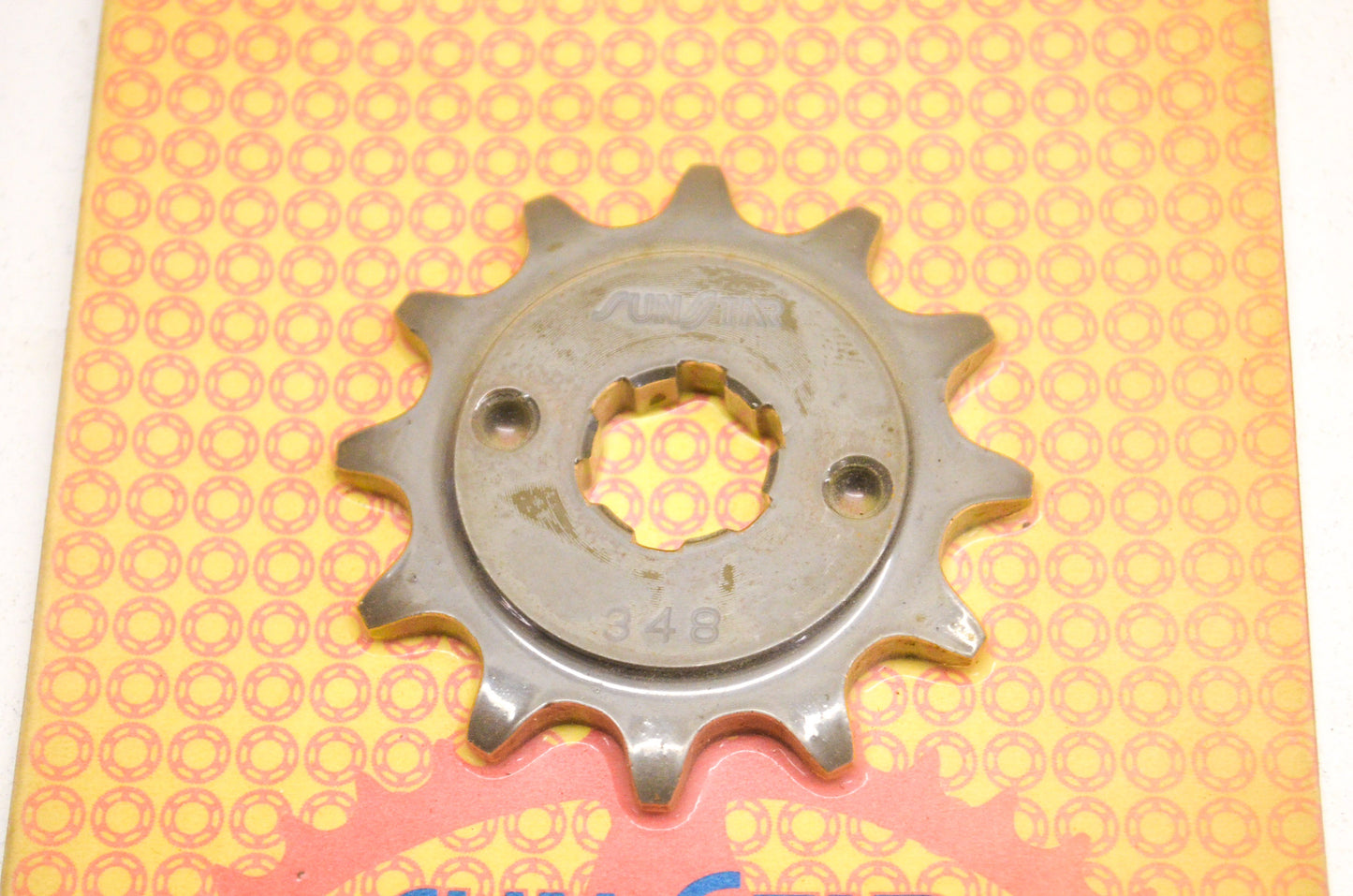 New OEM Sunstar 12 Tooth Front Sprocket NOS