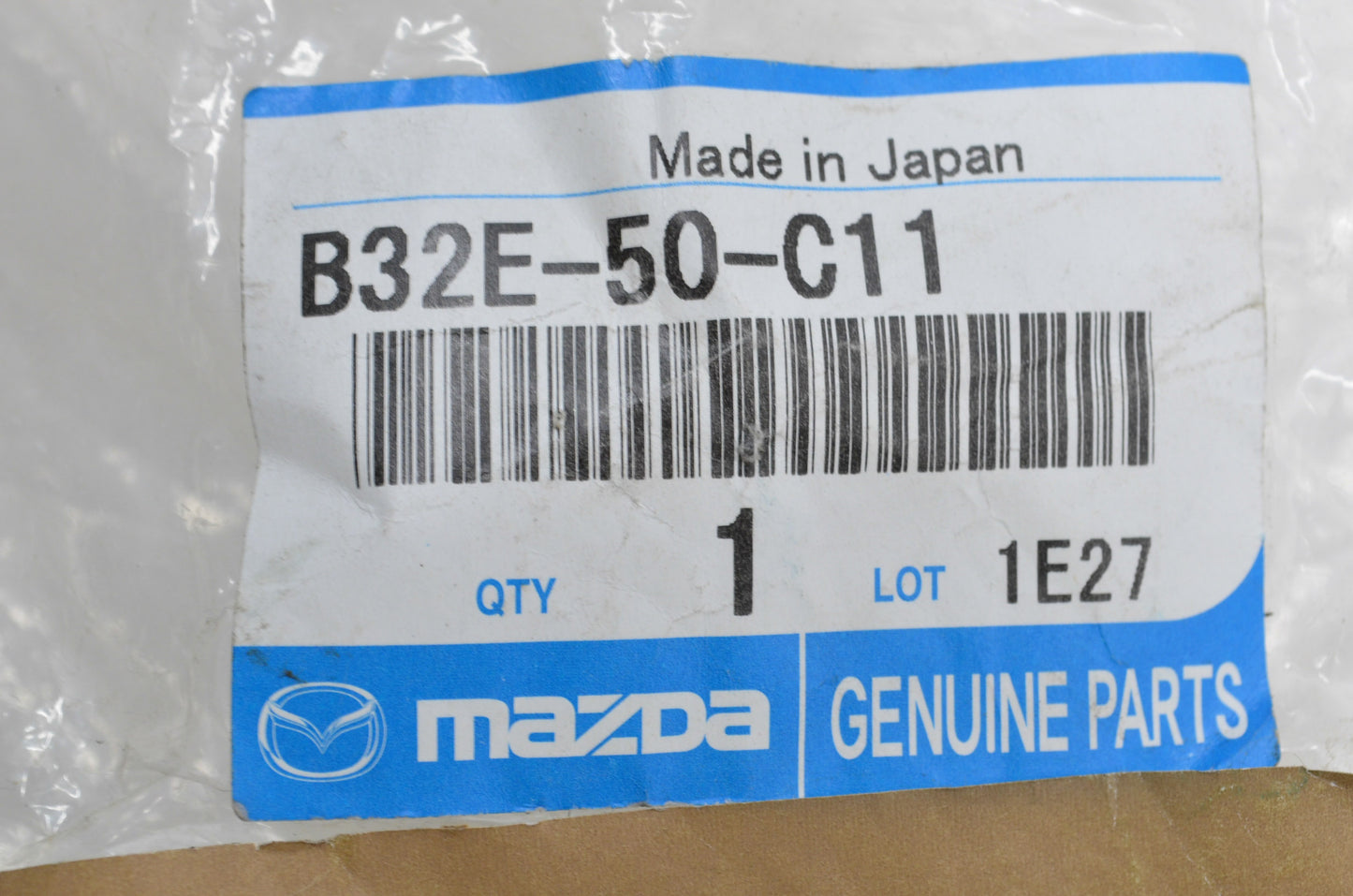 New OEM Mazda Right Headlight Lamp Cover NOS