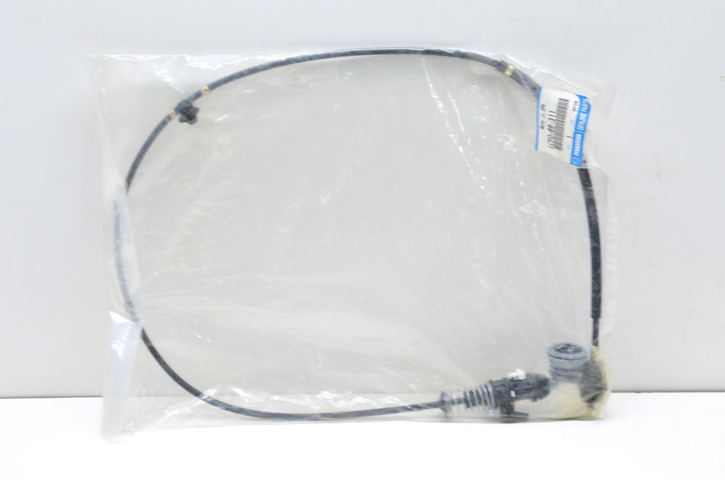 OEM Mazda LCY0-66-311 ACC Cable NOS