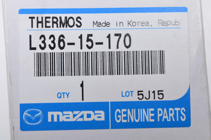 New OEM Mazda Thermostat Housing Assembly NOS