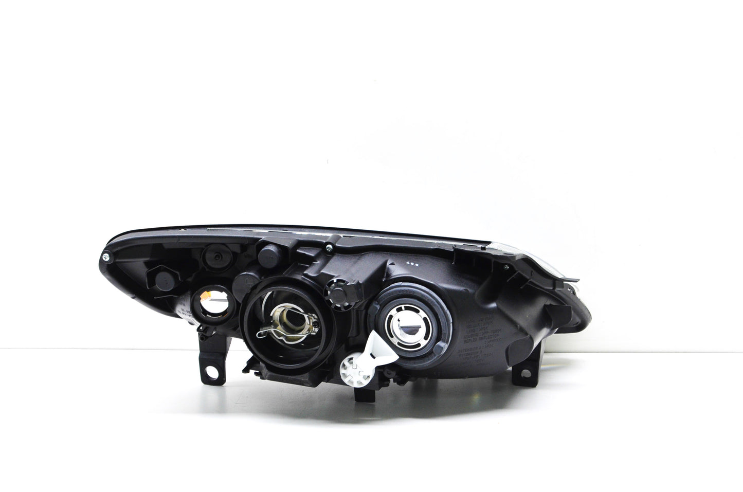 OEM Mazda FF14-51-0L0E Head Light Assembly NOS