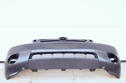 OEM Mazda ECY1-50-031K-BB Front Bumper NOS