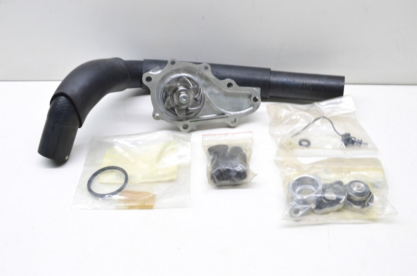 New OEM Mazda Water Pump Kit NOS