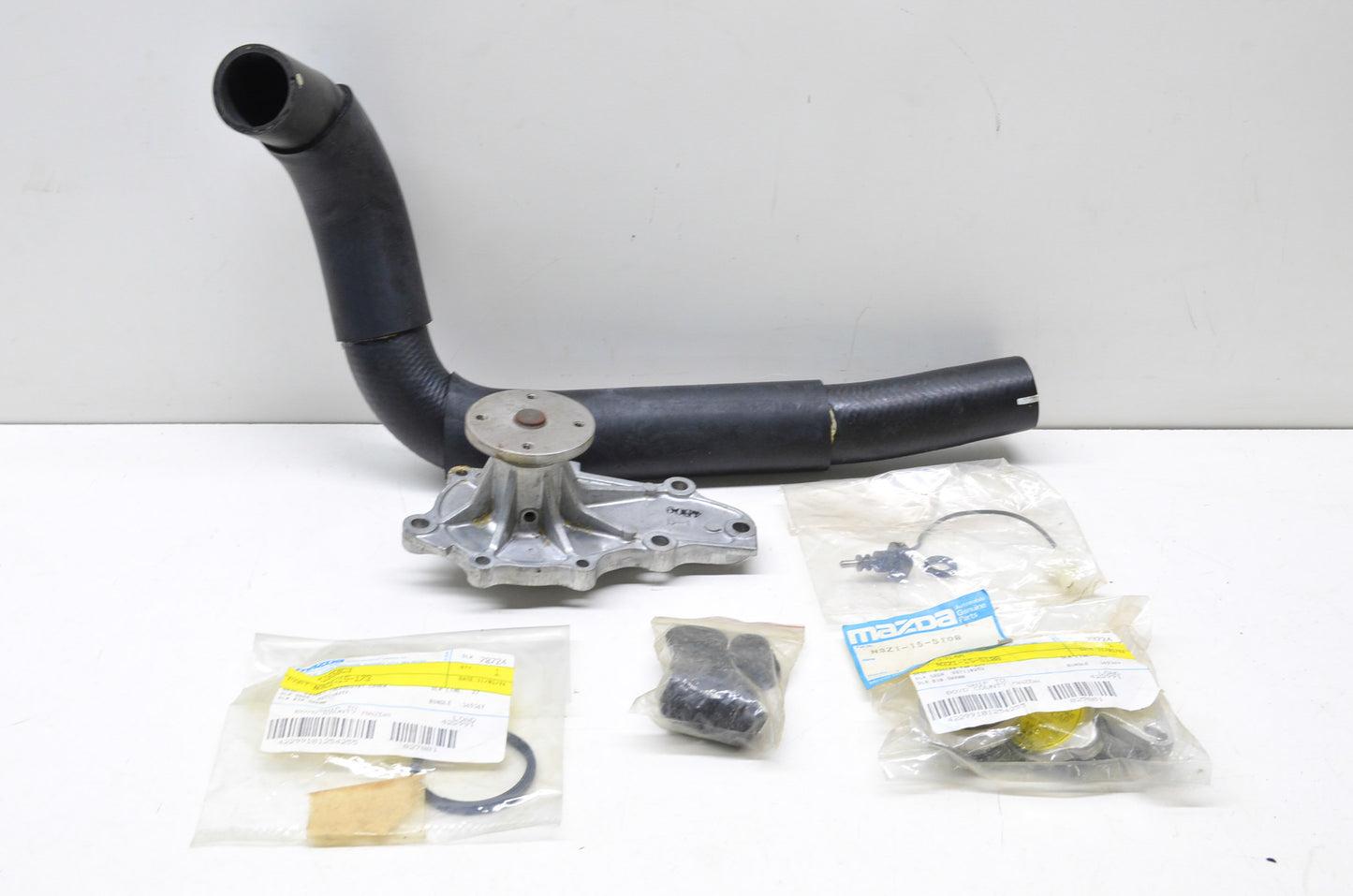 New OEM Mazda Water Pump Kit NOS