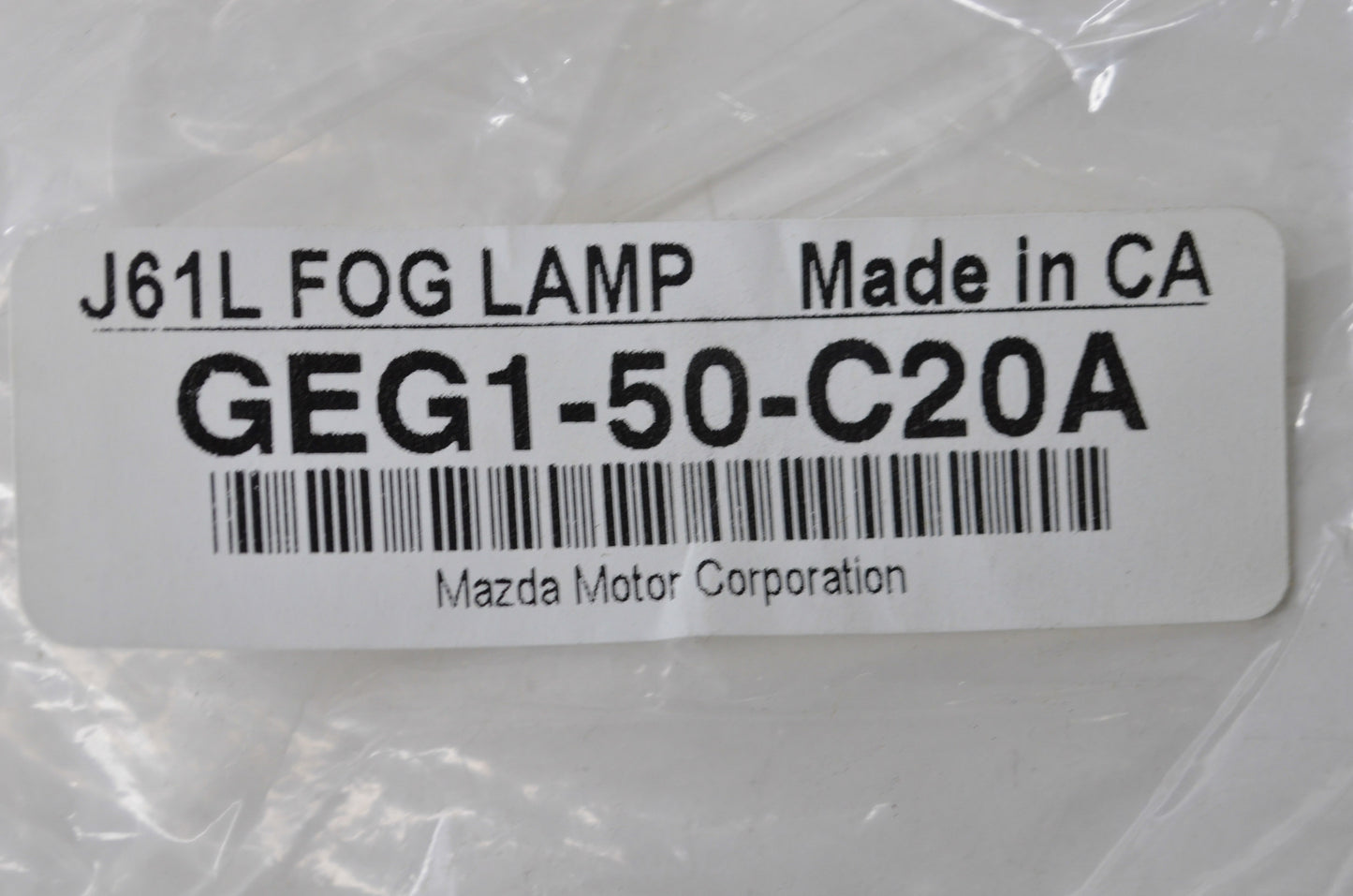 New OEM Mazda Driver Side Fog Lamp Housing NOS