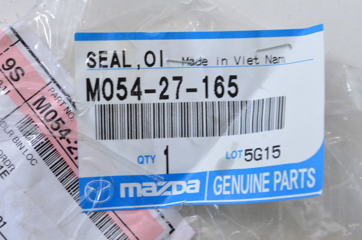 OEM Mazda M054-27-165 Oil Seal NOS