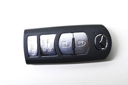 New OEM Mazda Keyless Entry Transmitter NOS