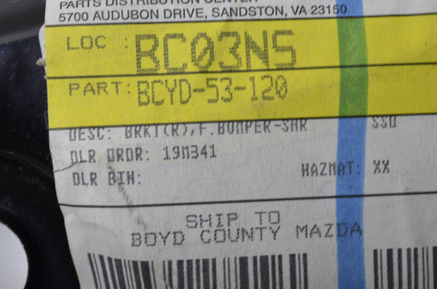 OEM Mazda BCYD-53-120 Right Front Bumper Bracket NOS