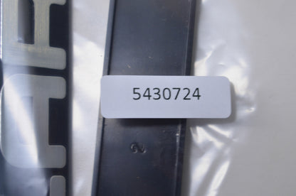 New OEM Polaris 5430724 Black/Silver Bumper Emblem NOS