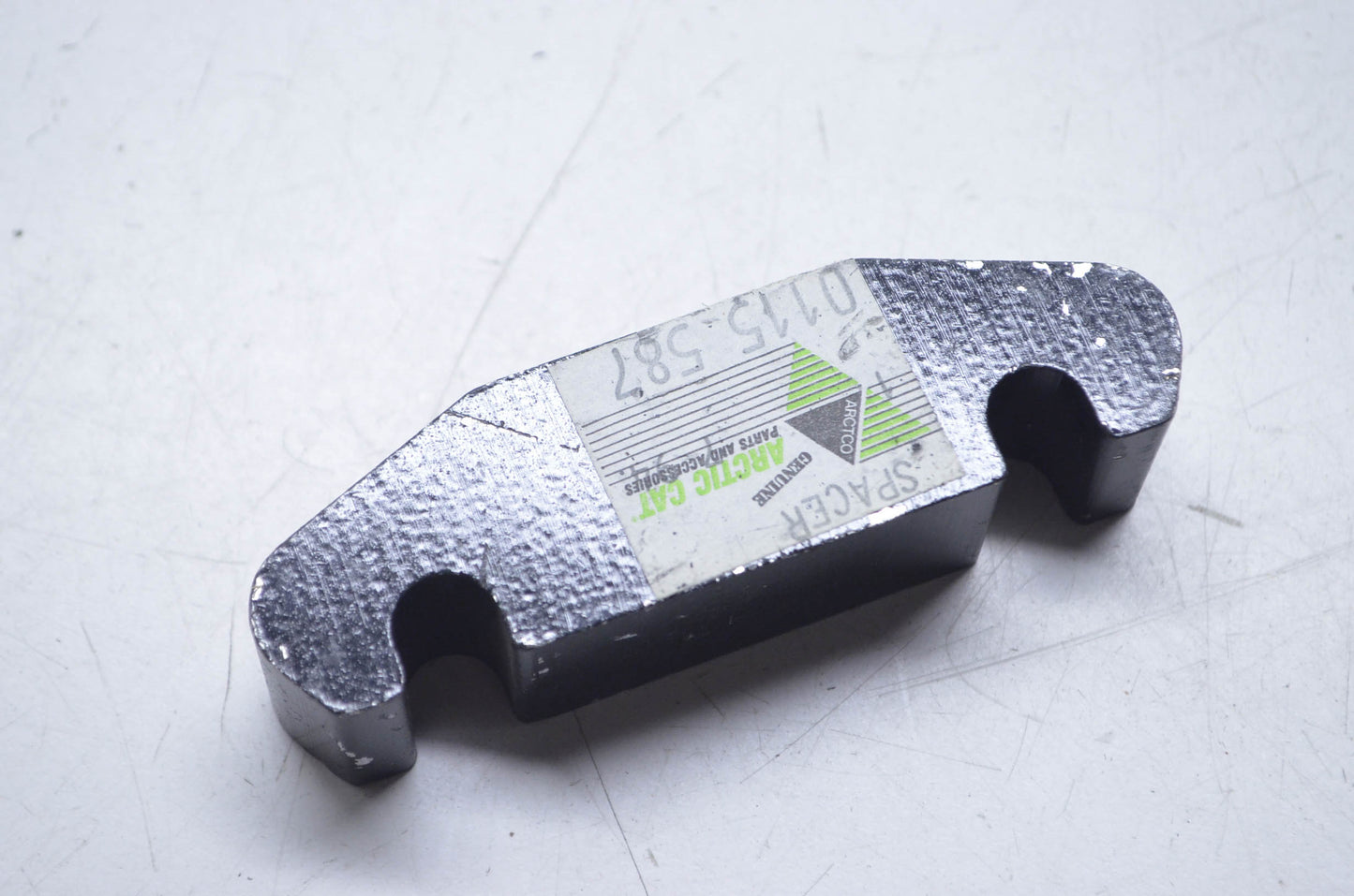 OEM Arctic Cat 0115-587 Brake Bracket Spacer NOS