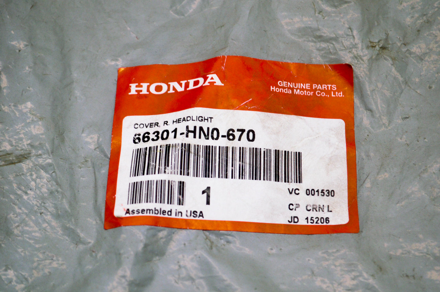 OEM Honda 66301-HN0-670 Right Headlight Cover NOS