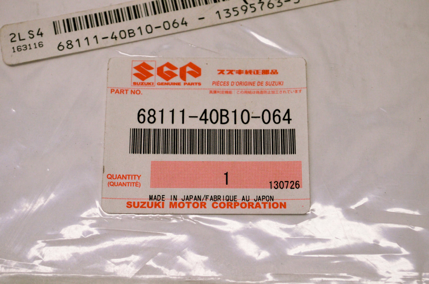 New OEM Suzuki 68111-40B10-064 Fuel Tank Emblem NOS
