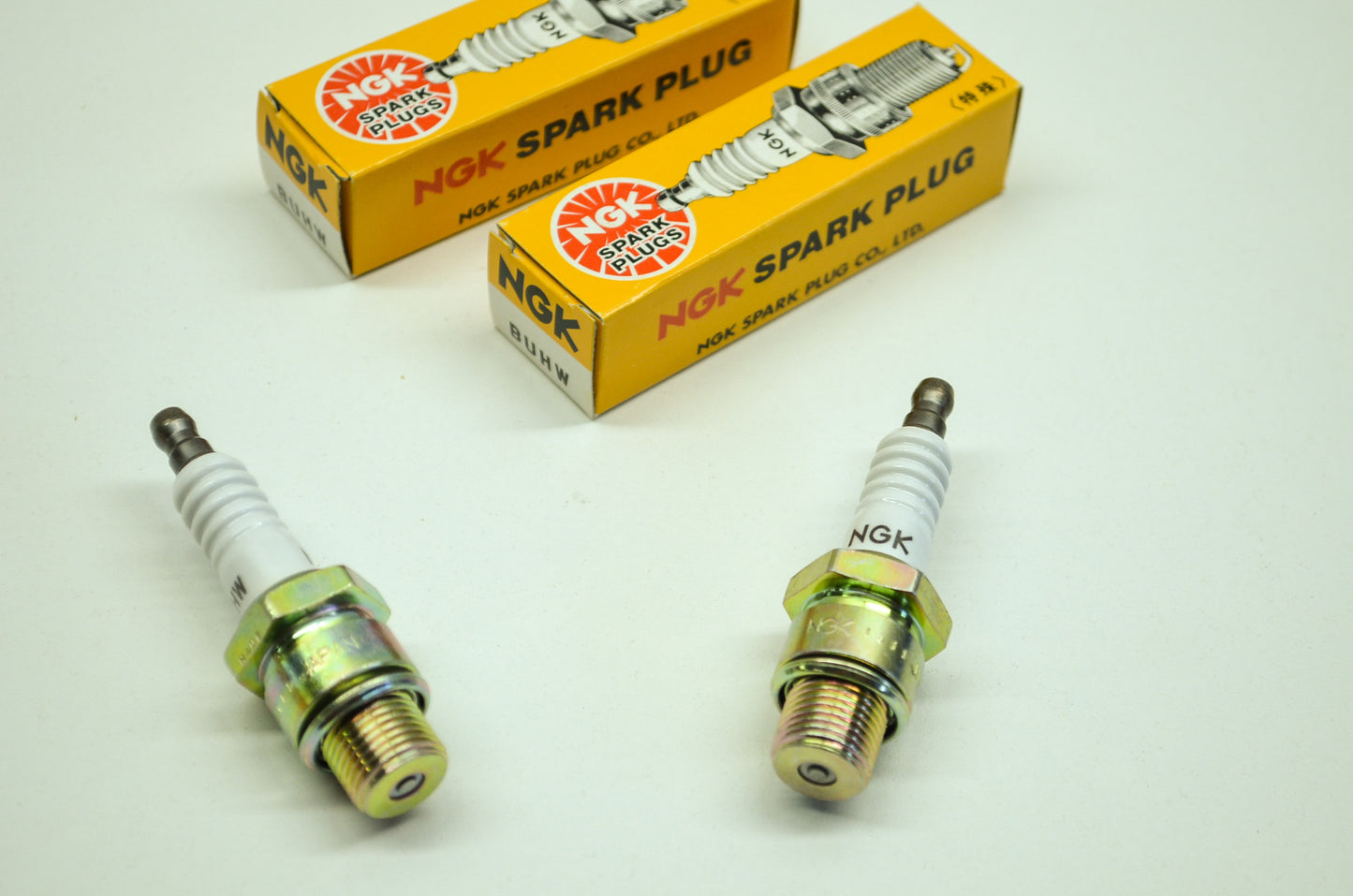New NGK BUHW Spark Plugs Qty 2 NOS