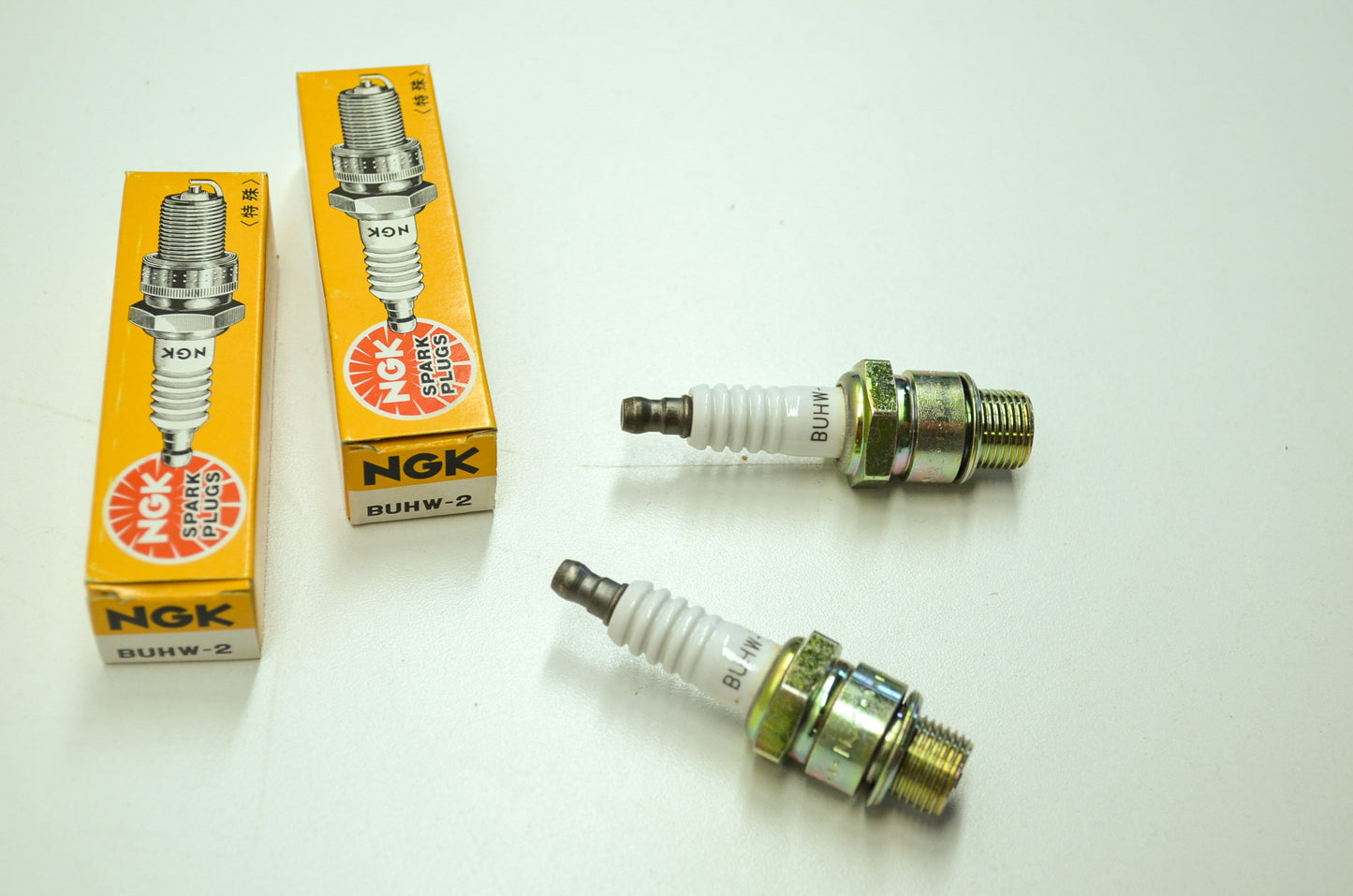 New NGK BUHW-2 Spark Plugs Qty 2 NOS