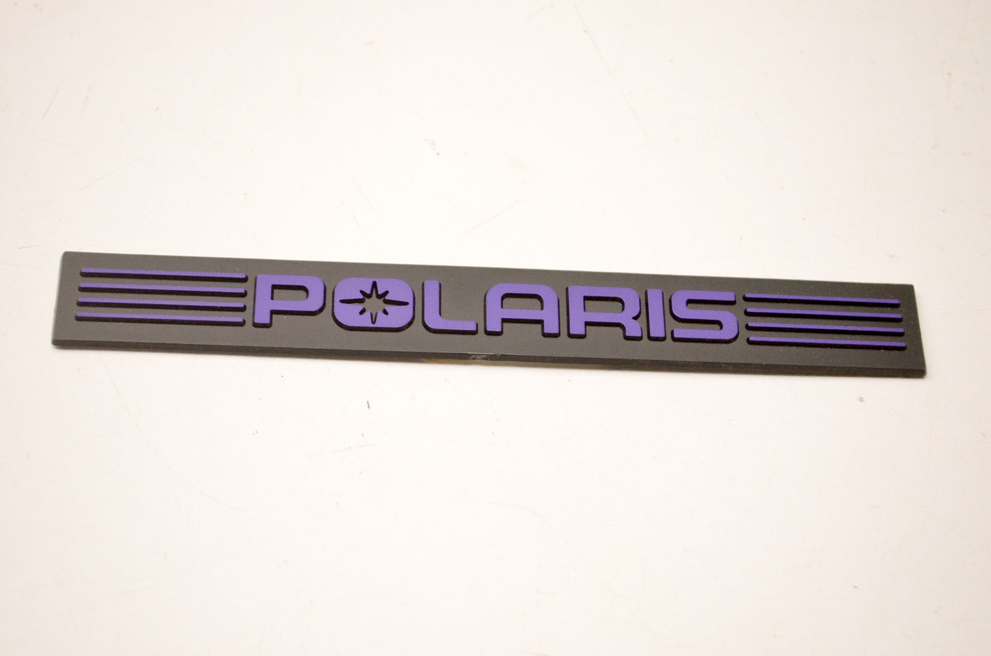 OEM Polaris 5430979-198 Violet Emblem NOS