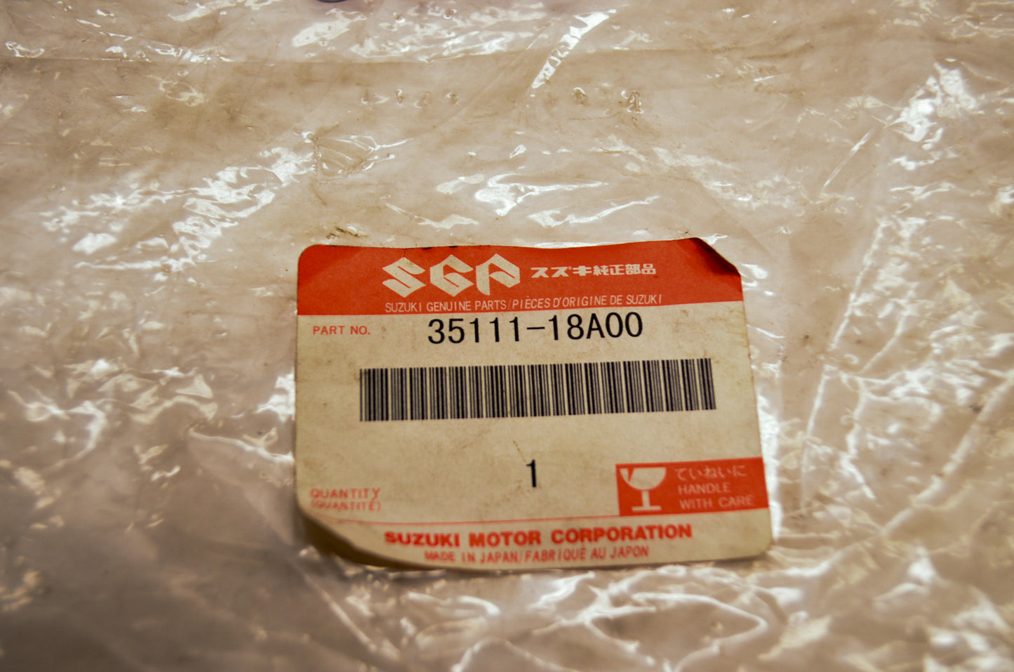 OEM Suzuki 35111-18A00 Headlamp Rim NOS