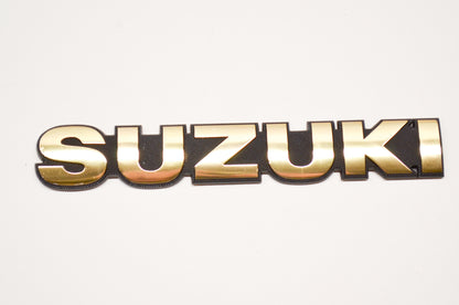 OEM Suzuki 68111-24A00 Emblem NOS