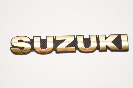 OEM Suzuki 68111-24A00 Emblem NOS