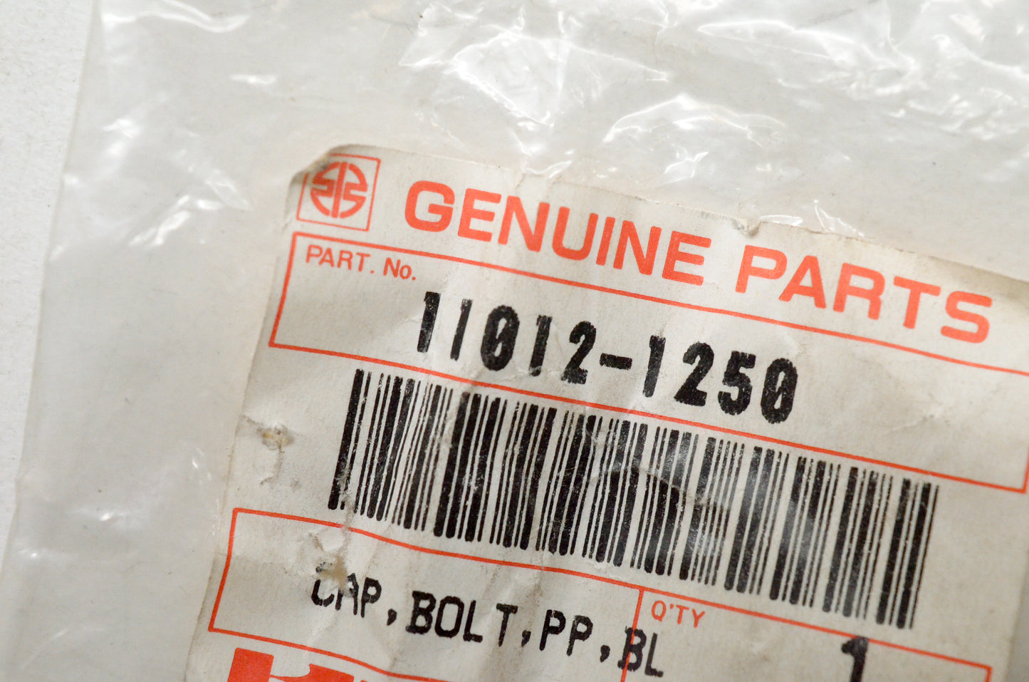 OEM Kawasaki 11012-1250 PP Black Bolt Cap NOS
