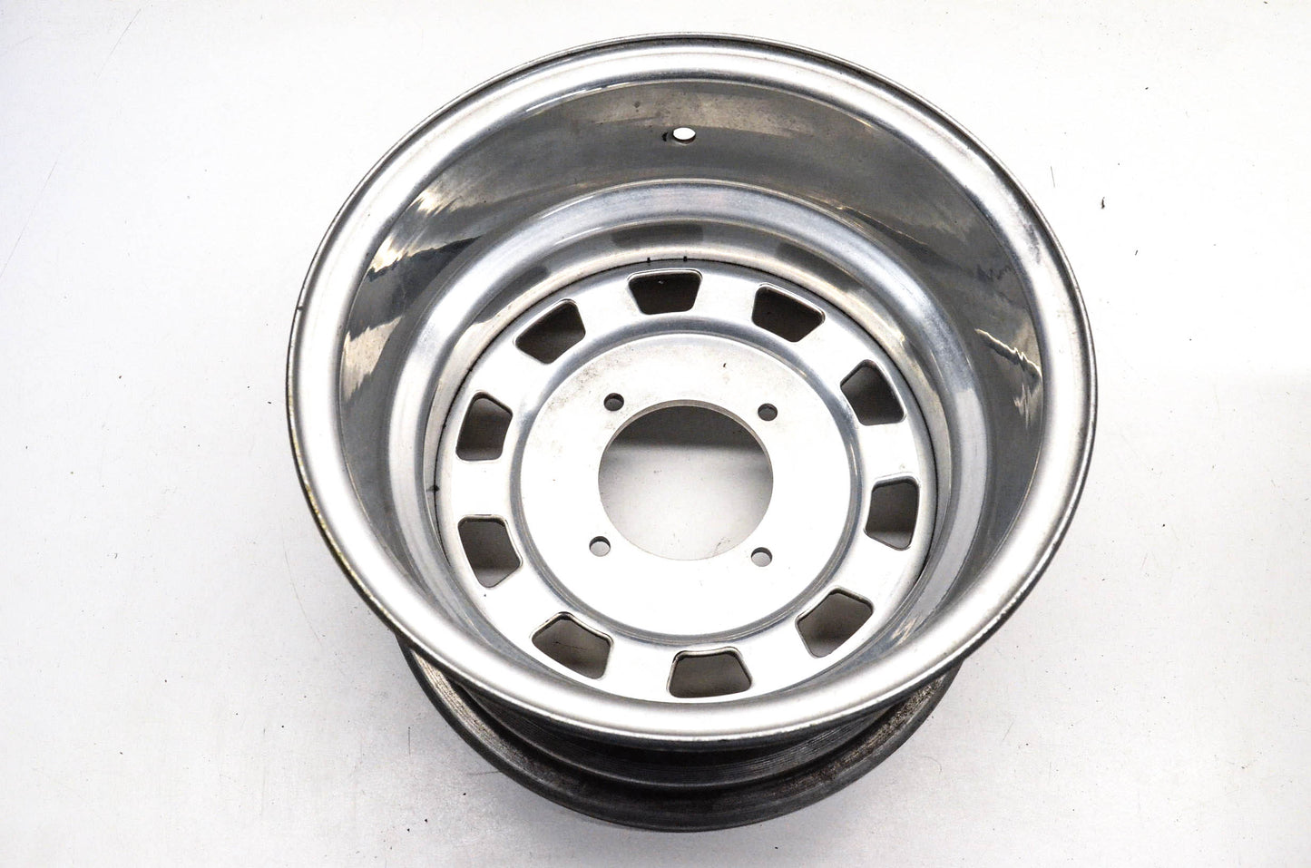 Aftermarket 7x12 Deep Offset 4 Bolt Silver Rear Wheel Rim