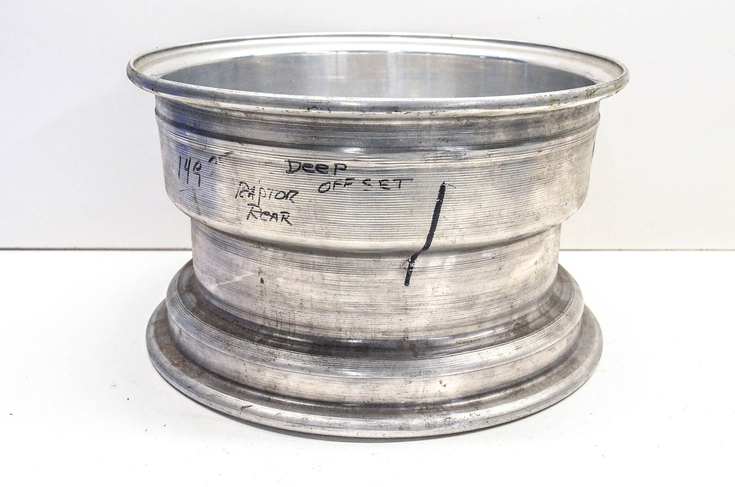 Aftermarket 7x12 Deep Offset 4 Bolt Silver Rear Wheel Rim
