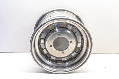Aftermarket 7x12 Deep Offset 4 Bolt Silver Rear Wheel Rim