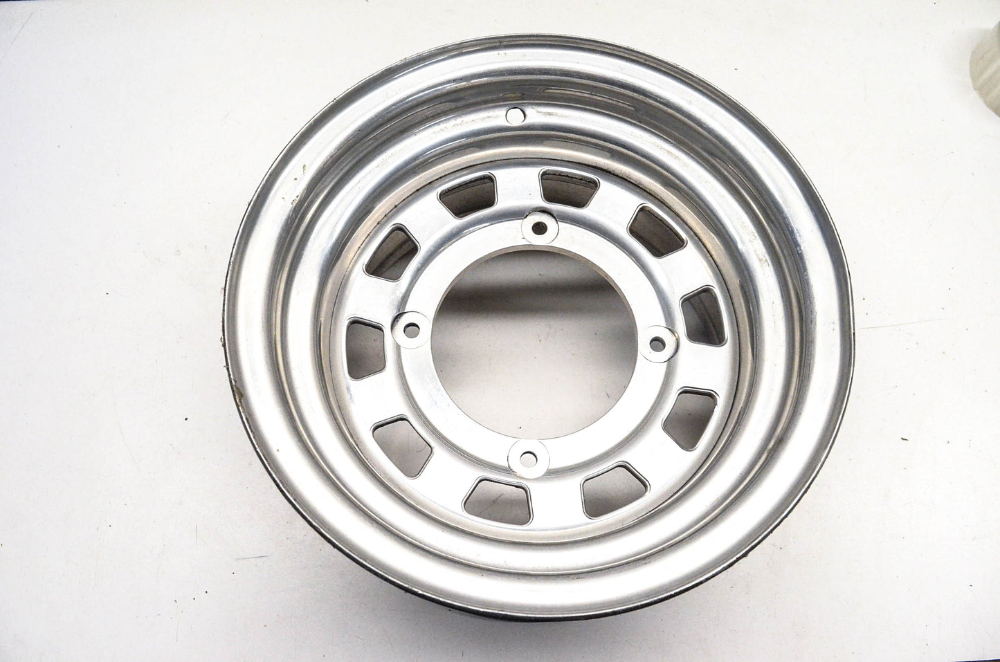 Aftermarket 7x12 Shallow Offset 4 Bolt Silver Rear Wheel Rim