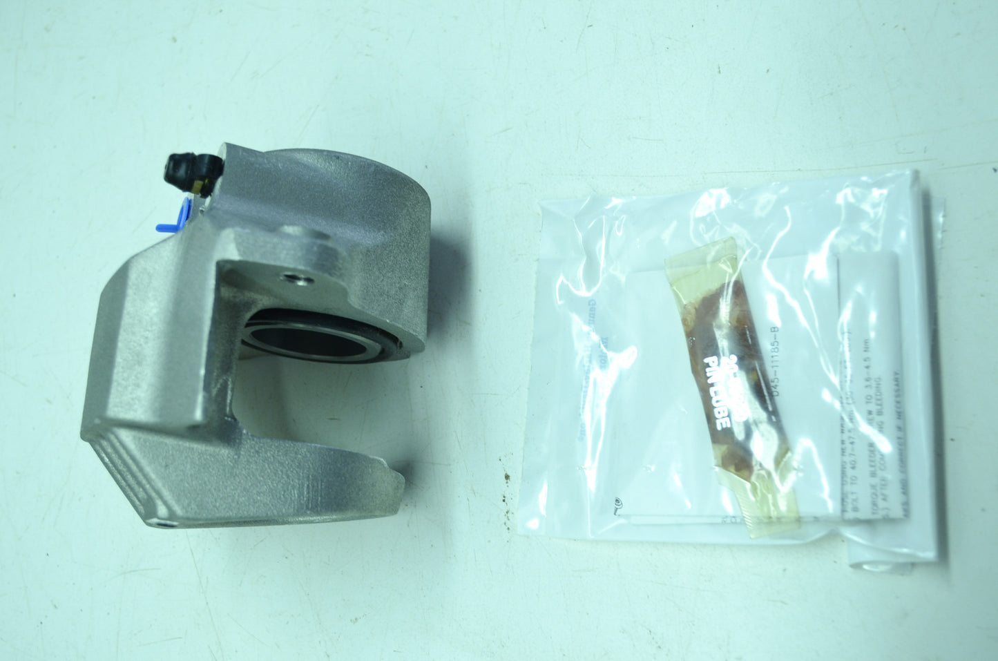 OEM Harley-Davidson 44076-86A Black Caliper Assembly NOS