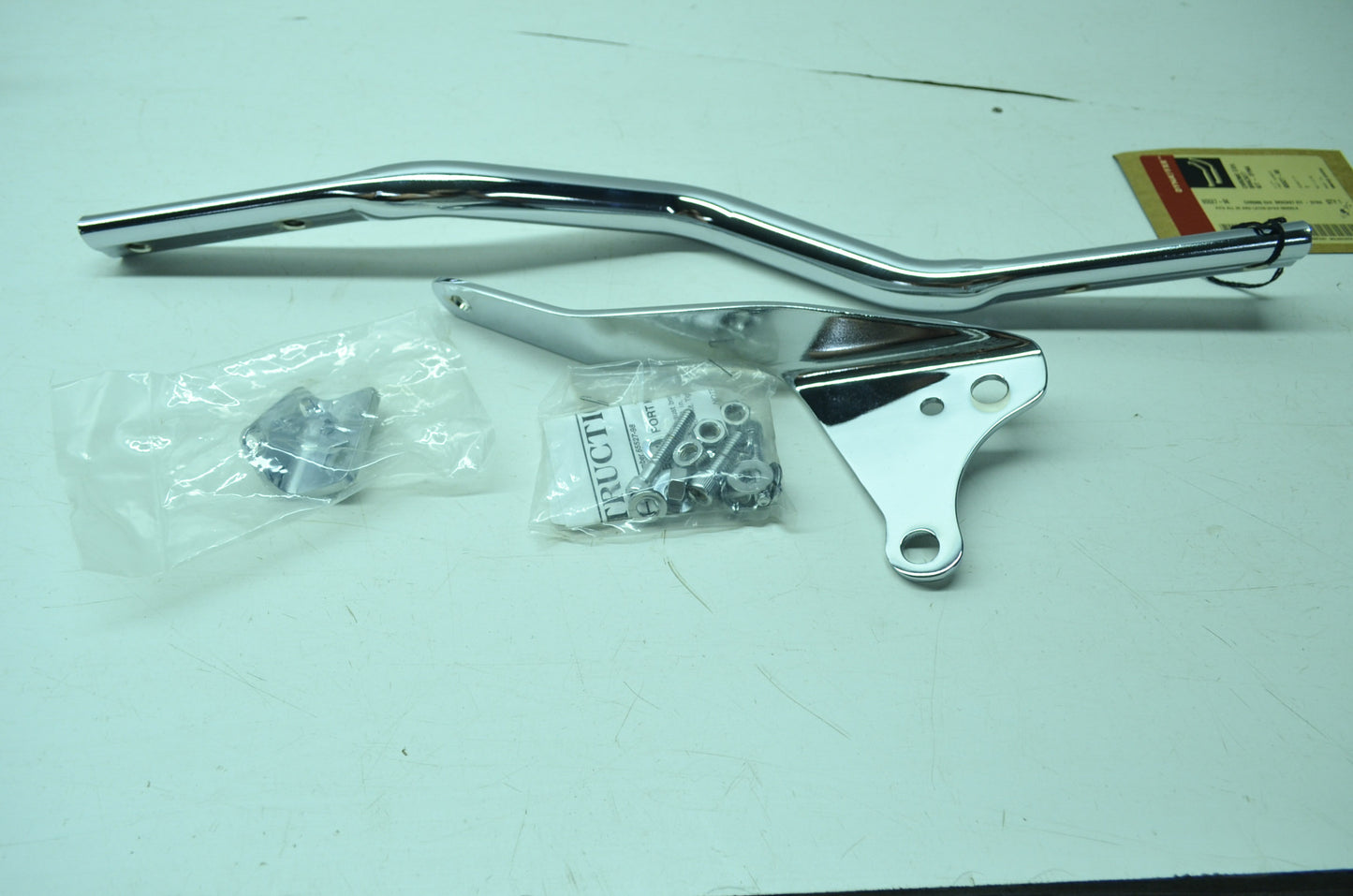 NEW OEM Harley Davidson Chrome Exhaust Bracket FXD Dyna 65527-98 NOS