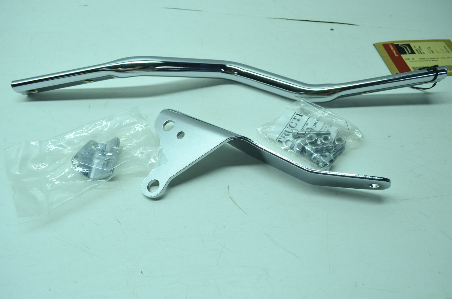 NEW OEM Harley Davidson Chrome Exhaust Bracket FXD Dyna 65527-98 NOS
