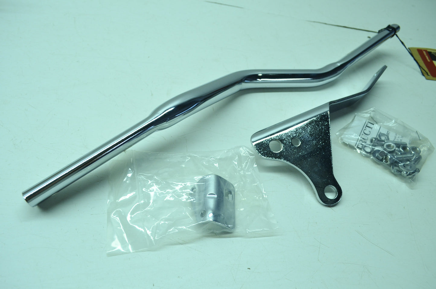 NEW OEM Harley Davidson Chrome Exhaust Bracket FXD Dyna 65527-98 NOS