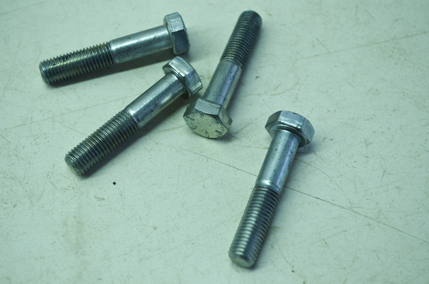 OEM Harley-Davidson 4041W Carrier Bolt Qty 4 NOS